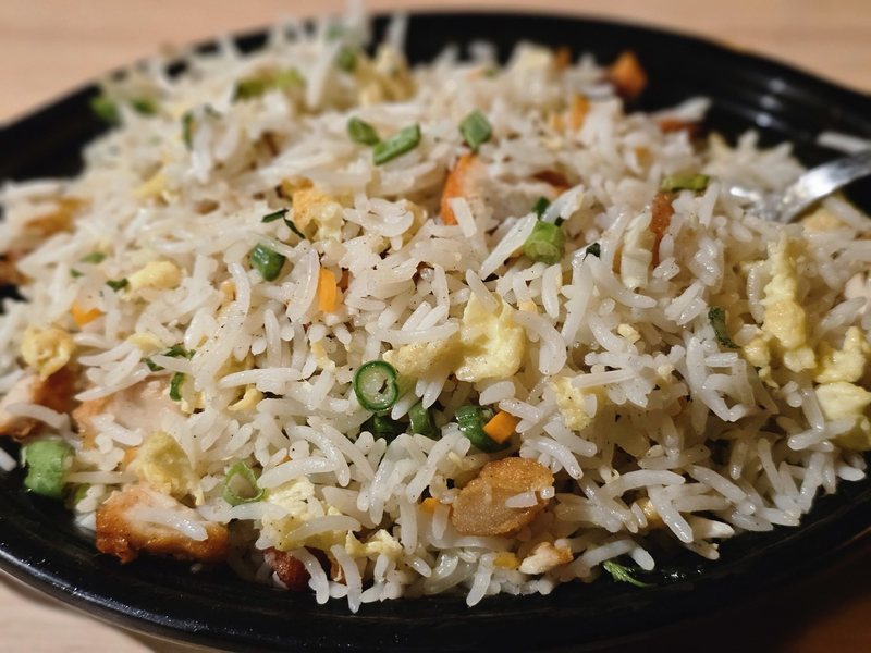A plate of vegetable fried rice