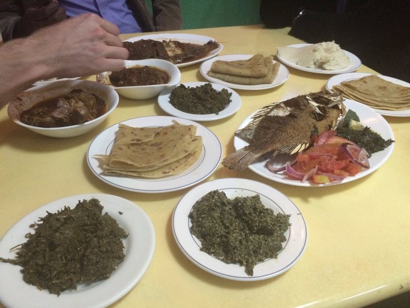 A Kenyan table laid with several dishes