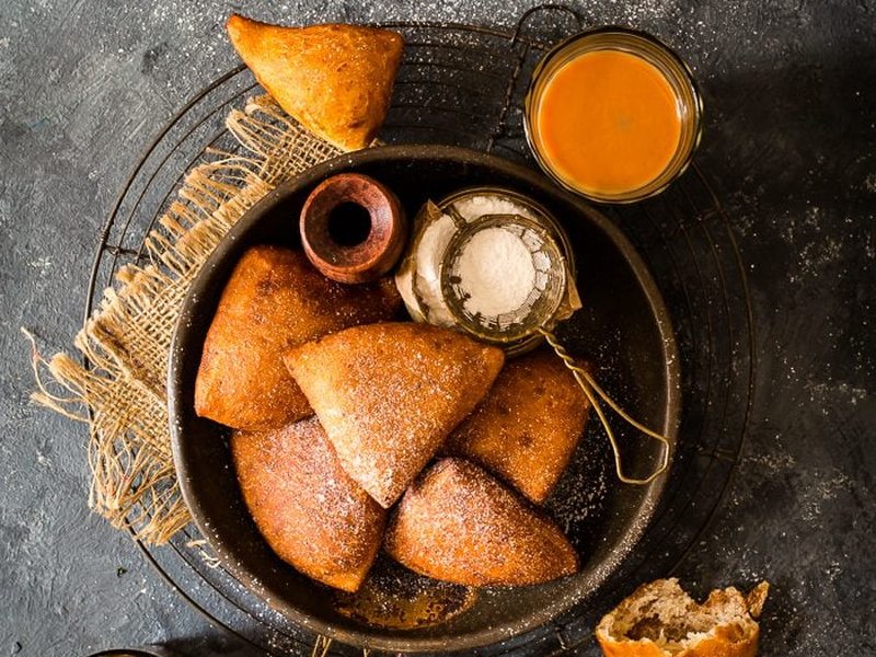 Freshly fried mandazi on a cloth