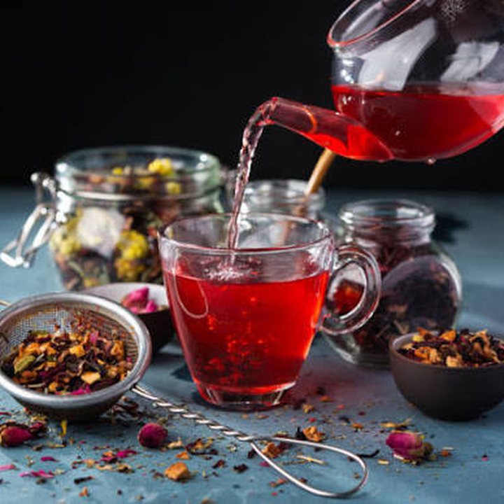 Hibiscus tea being poured
